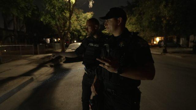 Officer Nate Palomino looking for gun casings