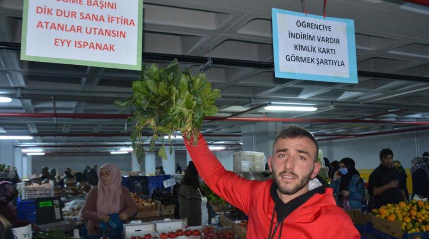 Ispanak satışları düşen esnaf çareyi afiş asmakta buldu: Eğme başını dik tut