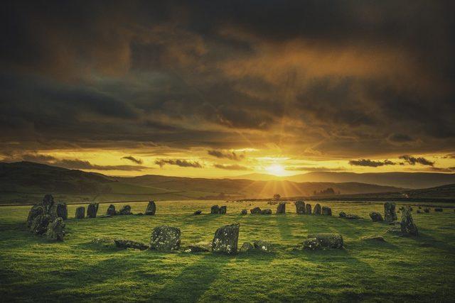 Swinside Stone Circle in the Lake District with a sunset