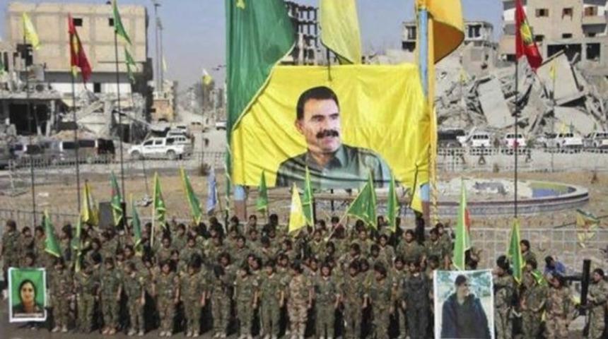 YPG'den skandal g&ouml;vde g&ouml;sterisi: &Ouml;calan posterleri astılar!