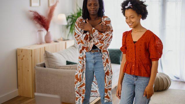 Two women filming a TikTok dance routine