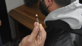 Ehliyet sınavında akılalmaz kopya düzeneği! Maskenin içine gizlemişler