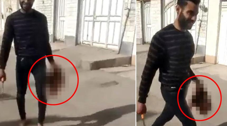 İran'da kan donduran görüntüler... Eşinin kafasını kesip poz verdi