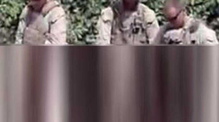 ABD'li askerler, &ouml;l&uuml;lerin &uuml;zerine 'işedi mi'?