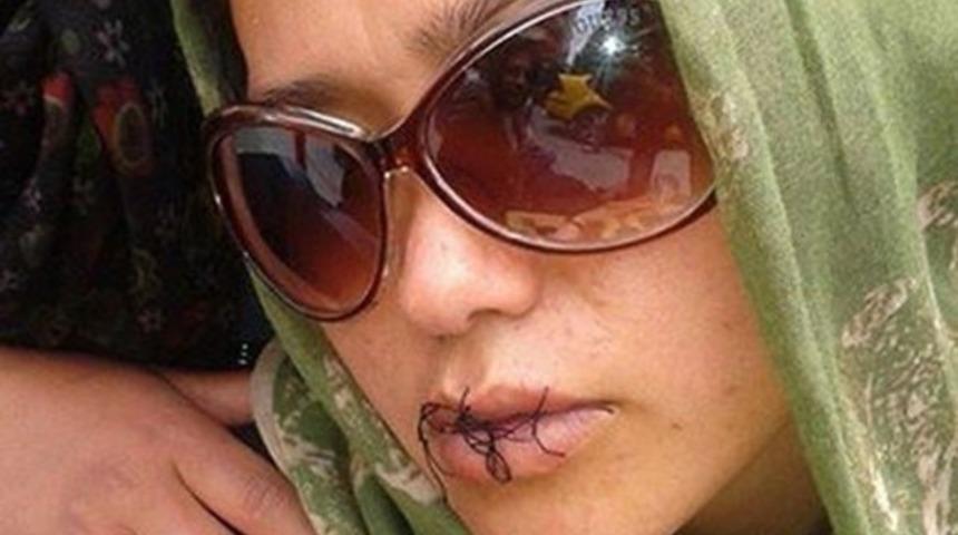 Afgan mülteciler Ankara'da ağızları dikili adalet bekliyor