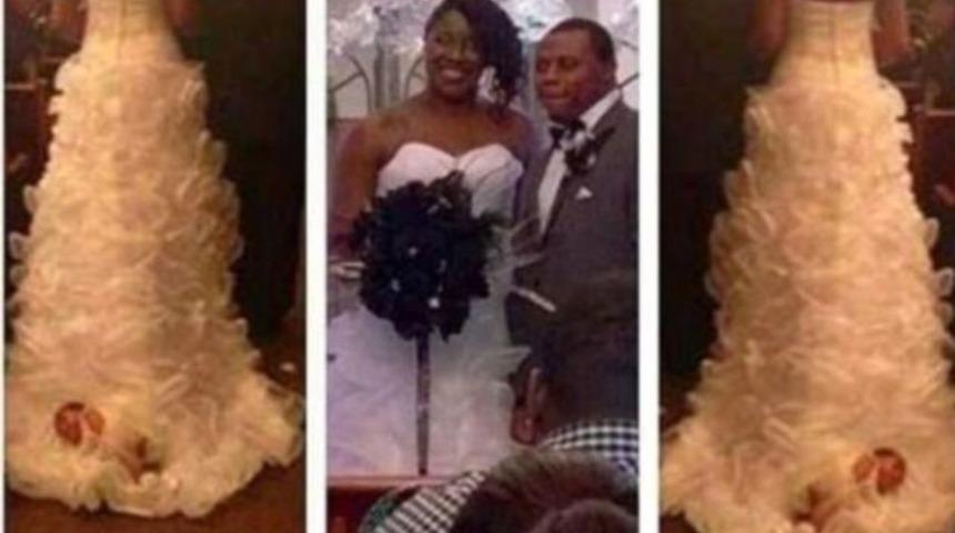 Gelinliğinin arkasına 1 aylık bebeğini taktı