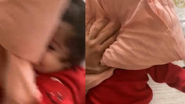 8 aylık kızını yastıkla boğmaya çalıştı! O anları cep telefonuyla kaydetti