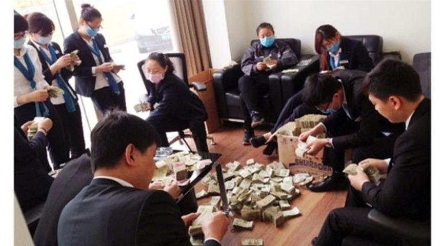 Bu parayı 20 kişi 6 saatte sayabildi