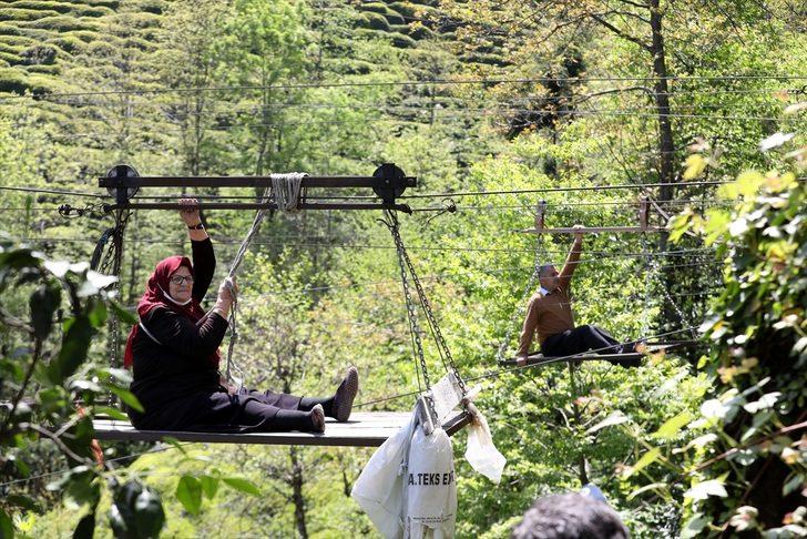 Ev ve arazilerine ilkel teleferikle ulaşıyorlar G5