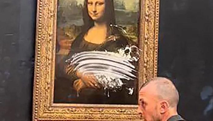 Dünyaca ünlü Mona Lisa tablosuna pastalı saldırı! Yaşlı bir kadın kılığındaydı
