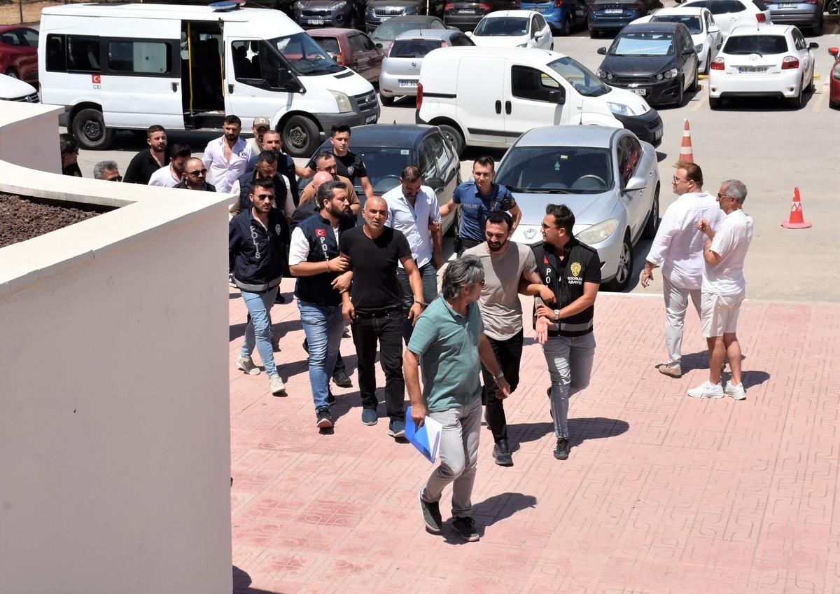 Bodrum'da h&uuml;k&uuml;ml&uuml;n&uuml;n yakalanmasına engel oldukları iddiasıyla 9 kişi tutuklandı