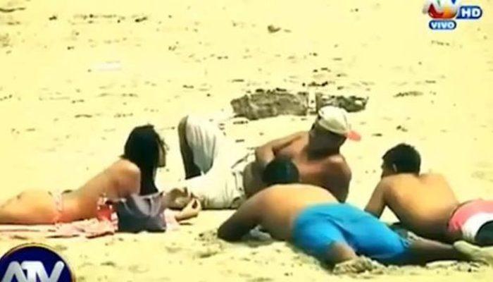 Plajda üstsüz güneşlenme deneyi yapan kadın, erkeklerin tacizine uğradı! O anlar saniye saniye kaydedildi