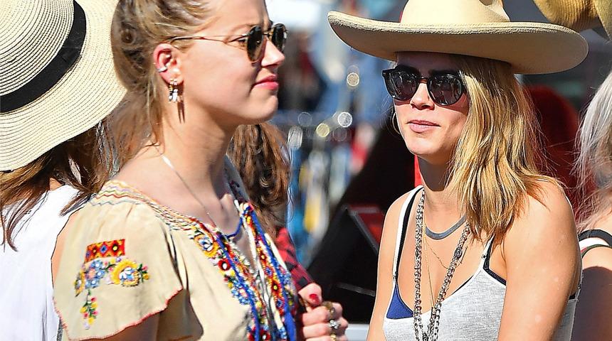 Amber Heard&rsquo;&uuml;n Cara Delevingne ile &ouml;p&uuml;şme g&ouml;r&uuml;nt&uuml;leri ortaya &ccedil;ıktı