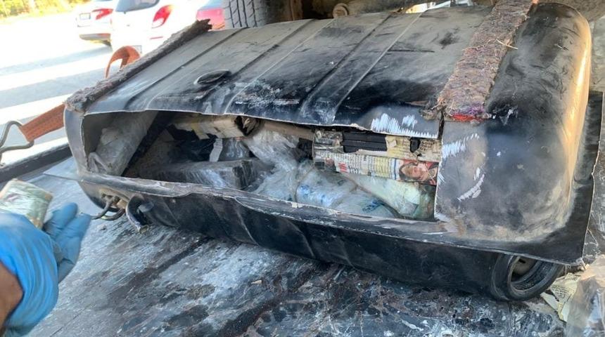 Hatay'da otomobilin yakıt deposundan 11 ruhsatsız tabanca çıktı