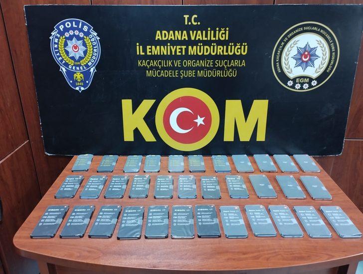 Adana'da sahte içki ve kaçak ürün operasyonunda 2 kişi yakalandı G1