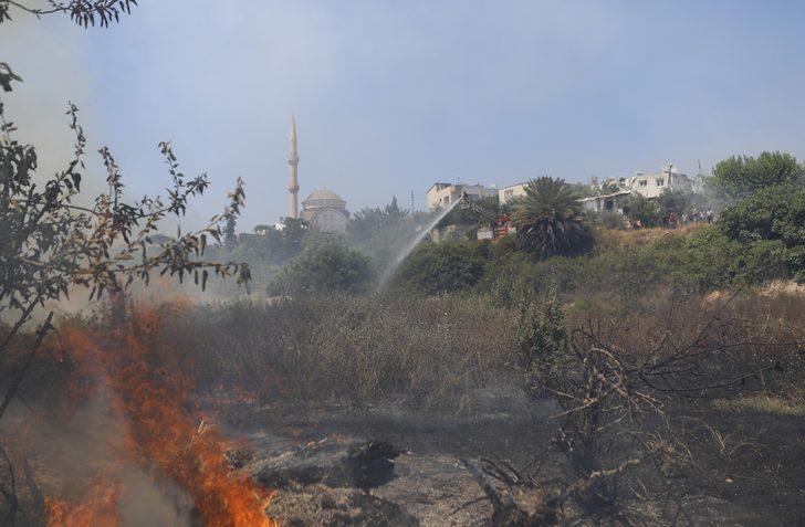 Mersin'de ağaçlık alanda çıkan yangın söndürüldü G2