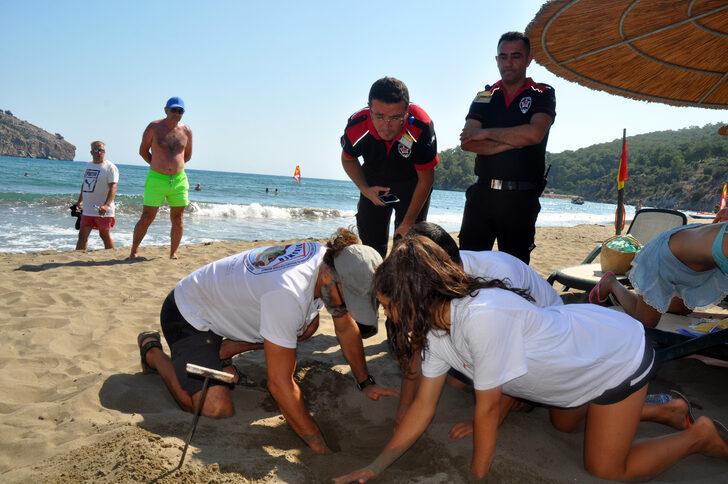 Muğla'da şezlongların arasındaki caretta caretta yuvası korumaya alındı G4