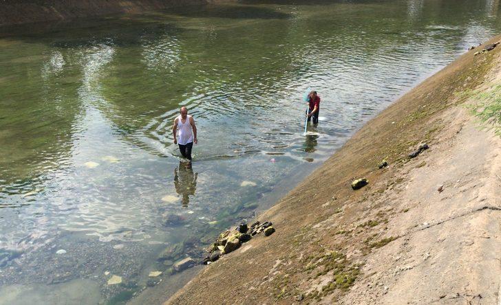 Adana'da yeğenini kurtarmak için girdiği kanalda kaybolan kişinin cansız bedenine ulaşıldı G1