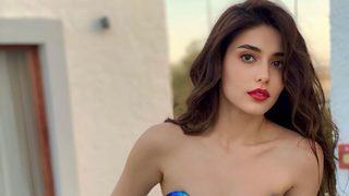 Semih Öztürk'ün eşi Kurretülayn Matur kırmızı, süper mini eteğiyle poz verdi!