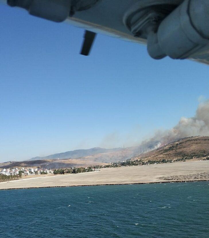 İzmir'de otluk alanda çıkan yangına müdahale ediliyor G2