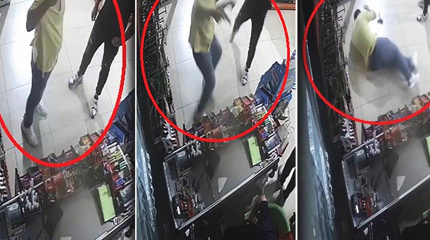 Markette kan donduran anlar! Başkasının elindeki tabancayı kafasına dayayıp tetiği çekti