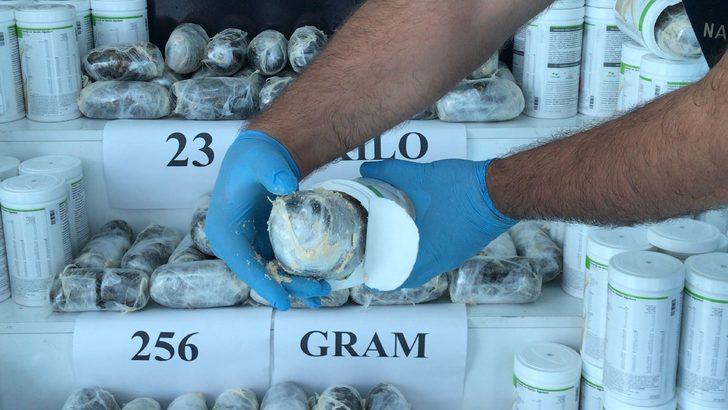 Adana'da otobüsteki zayıflama kürü kutularından 23 kilo 256 gram esrar çıktı G3