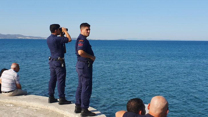 Balıkesir'de teknenin batması sonucu kaybolan 2 kişiyi arama çalışması sürdü G1