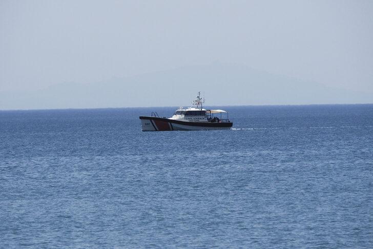 Balıkesir'de teknenin batması sonucu kaybolan 2 kişiyi arama çalışmaları sürüyor G1