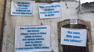 KKTC'de Türkeş'e pankartlı protesto