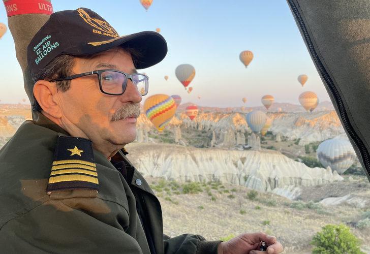 Kapadokya'nın ilk balon pilotu 35'nci yılını gökyüzünde pasta keserek kutladı G3