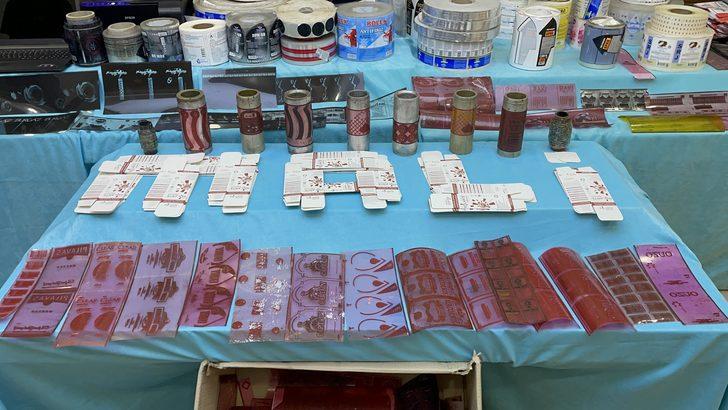 İstanbul'da sahte etiket ve bandrol üreten 2 zanlı yakalandı G2