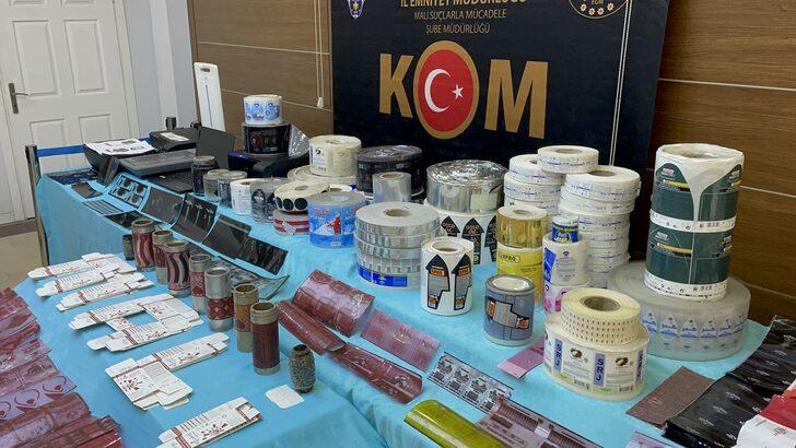 İstanbul'da sahte etiket ve bandrol üreten 2 zanlı yakalandı G4