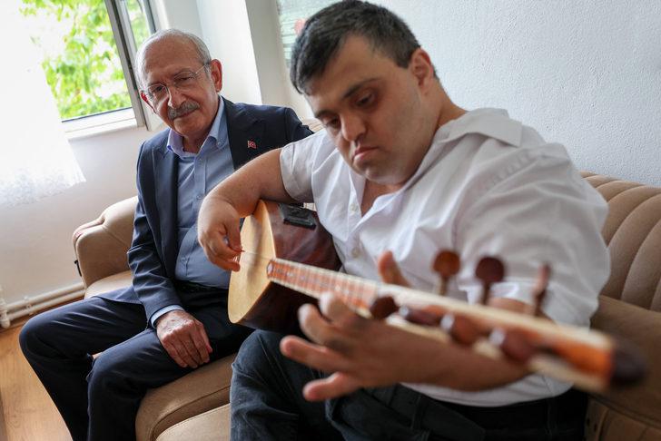 CHP Genel Başkanı Kılıçdaroğlu'ndan down sendromlu bağlama sanatçısı Çağatay Aras'a ziyaret G3