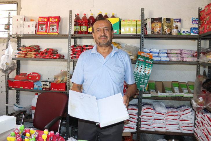 Osmaniye'de gizli hayırsever, bakkalın veresiye defterini satın aldı G3