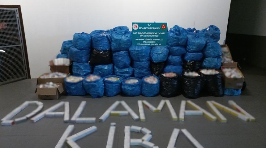 Dalaman'a inen uçaktaki 49 yolcunun valizinden 75 bin 740 paket elektronik sigara kartuşu çıktı