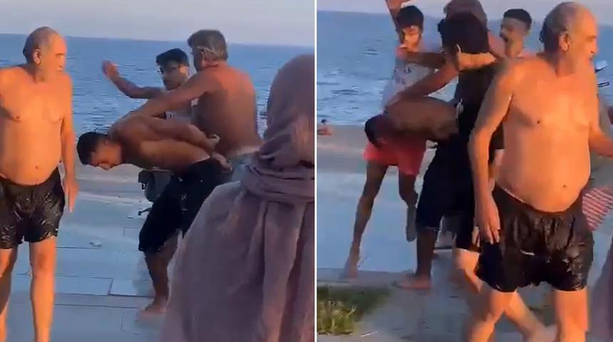 Sahilde iğrenç taciz ortalığı karıştırdı! Genç kızın gizlice fotoğrafını çeken yabancı uyruklu 3 kişi tekme tokat dövüldü