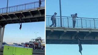 Büyükçekmece'de ilginç intihar girişimi! Kıyafetlerini çıkardı, üst geçitten sarktı...