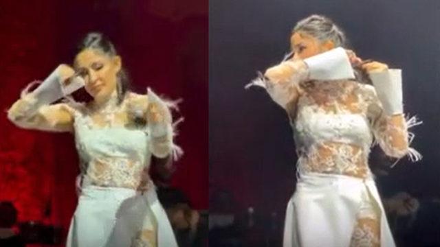 Melek Mosso İranlı kadınlara destek için Harbiye'deki konserinde saçlarını kesti! 