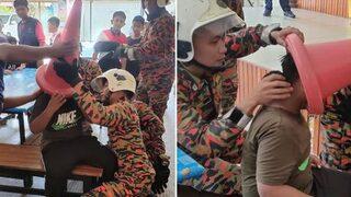 Şakanın sonu kötü bitti! 10 yaşındaki çocuğun kafasına trafik konisi sıkıştı... Çıkartmak için adeta seferber oldular