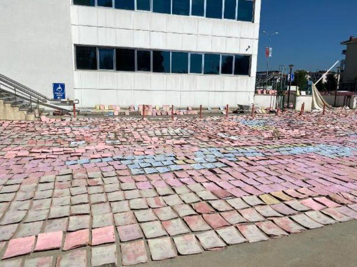 SGK'da şaşkına çeviren görüntü! 70 bin dosya bahçeye serildi G4