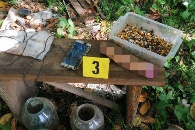 4_Russian-soldiers-buried-people-alive-as-dildos-and-torn-dentures-found-in-mini-Auschwitz-tortu