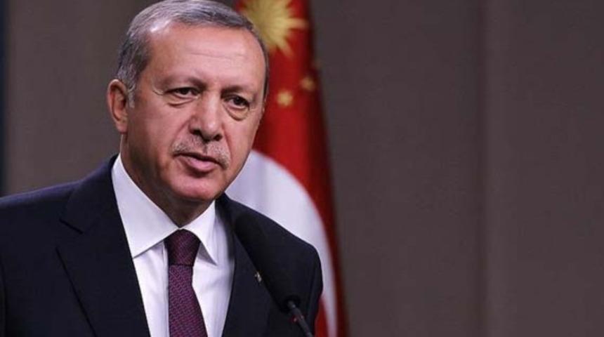 Erdoğan'dan, portresini &ccedil;izen engelliye Twitter'dan teşekk&uuml;r