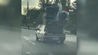 Aşırı yüklü otomobil görenleri şok etti! Bu kadar da olmaz