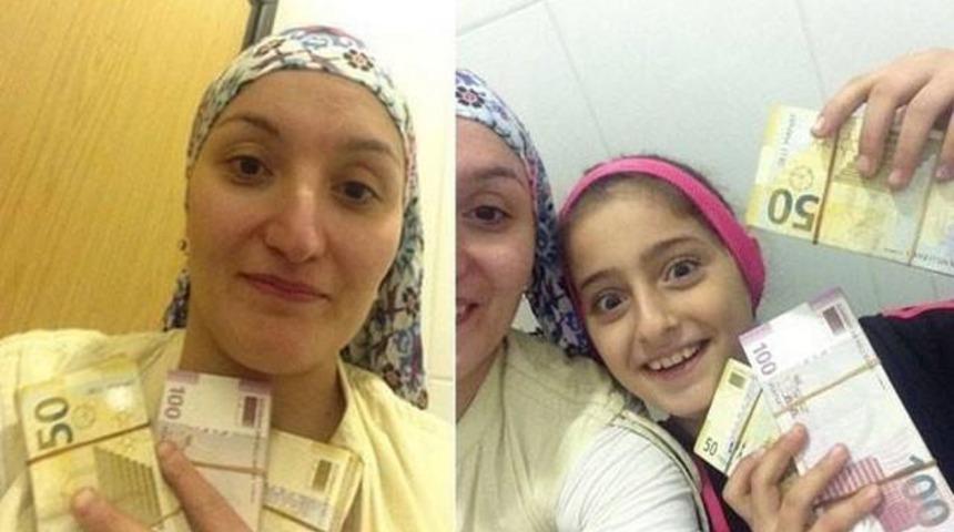 Bir &Ccedil;anta Dolusu D&ouml;viz Vulan Gen&ccedil; Bayan!a B&uuml;y&uuml;k &Ouml;d&uuml;l