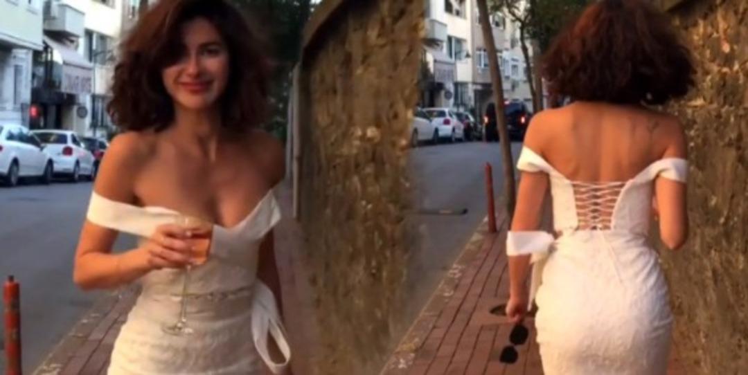 Nesrin Cavadzade, elinde şarap kadehiyle mahalleyi turladı