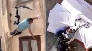 Mucize kurtuluş! Alev alev yanan binadan çamaşır ipine tutunarak atladı... Saniye saniye kaydedildi 