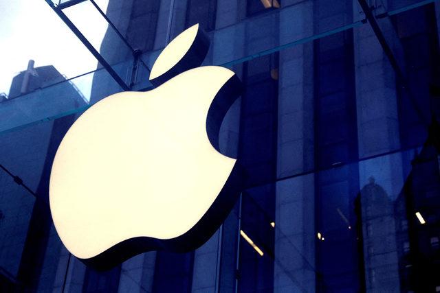 FILE PHOTO: The Apple Inc.  logo is seen hanging at the entrance to the Apple store on 5th Avenue in New York, US