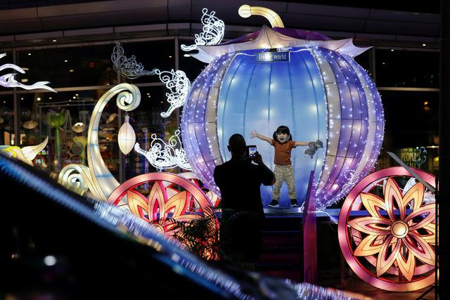 People enjoy a Chinese Lunar New Year Lantern Festival at the Living World shopping mall in South Tangerang