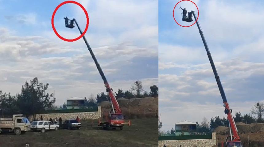 Akılalmaz görüntüler! Vinç sepetinde içki içip, rastgele ateş açtı...