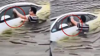 Sosyal medyada gündem olan görüntüler! Aracın içine sıkışan köpeği canı pahasına kurtardı